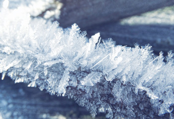 winter background with snowflakes crystals patterns and snow on frozen grass