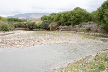Fototapeta na wymiar Ladakh, India - Jun 25 2019 - Indus River in Choglamsar, Ladakh, Jammu and Kashmir, India.