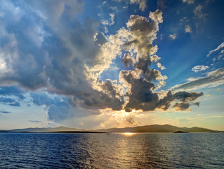 Antiparos sunset, colorful cloudy twilight sky  at the Aegean Sea, Greece Europe
