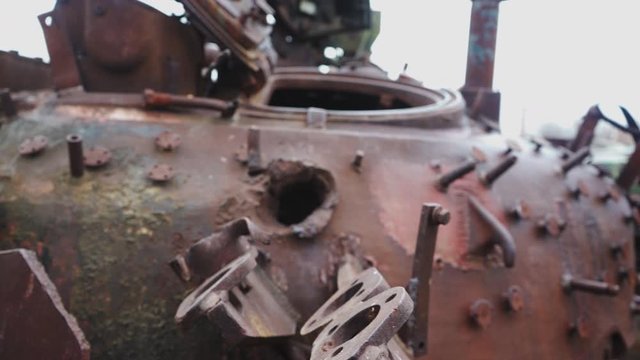 Lugansk, Ukraine - December 2, 2019: consequences of penetration of armor by a shell of a Russian T-64 tank
