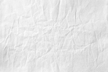 Fototapeta na wymiar crumpled old pale grey kraft background paper texture