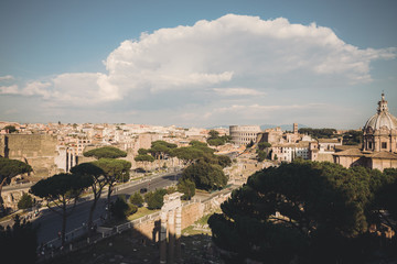 Fototapeta premium Panoramic view of city Rome with Roman forum and Colosseum from Vittoriano