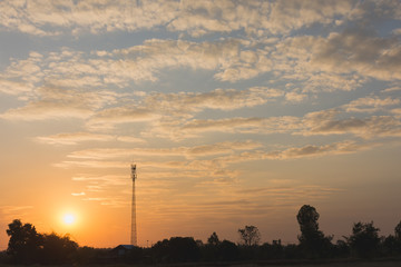 Silhouette phone antenna Sunset background