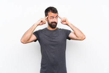 Fototapeta premium Young handsome man over isolated white background having doubts and thinking