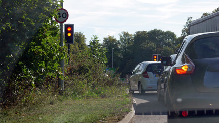 driver pov shot of vehicle driving british road in england
