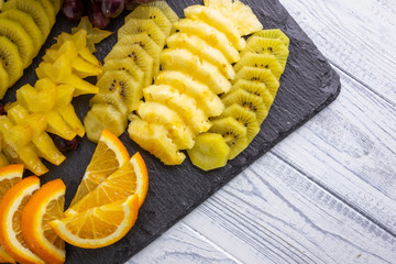 Sliced fruits on a plate