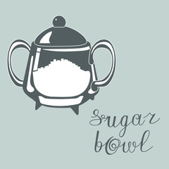 dark glass transparent sugar bowl with a lid on a gray isolated background with hand written inscription