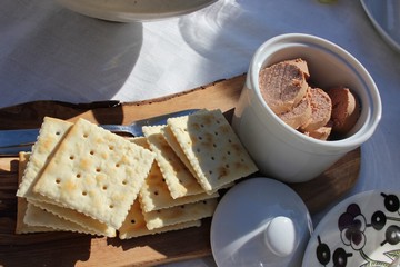 cup of coffee and cookies on wooden table