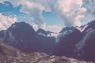 Panorama of mountains scene with dramatic blue sky in national park of Dombay