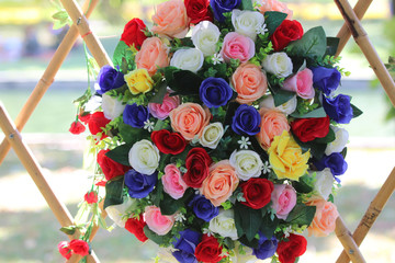 Colorful plastic roses flowers decoration for concepts Valentine, romantic and beautiful backdrop