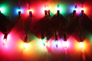 Christmas of blurred colorful lights on black background (celebration concept)