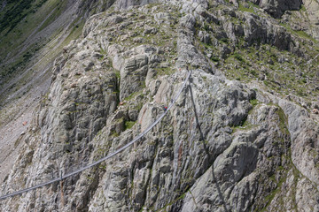 Closeup mountains scenes, walk to Trift Bridge in national park Switzerland