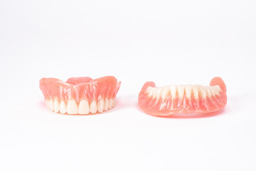 Two dentures.  Dental hygienist checkup concept with teeth model dentures. Regular dentist checkups