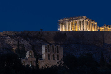Fototapeta na wymiar The Parthenon and Acropolis lit up at night