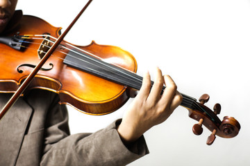 close up of a violinist hand , isolated on a white background 