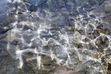 texture - the sunbeams on the ceiling of the cave