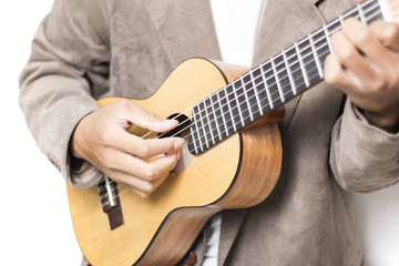 the guitarist is playing an acoustic guitar with blurred background