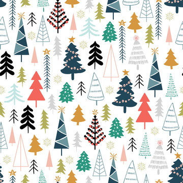 Winter seamless pattern with christmas trees, spruce woods on white background. Surface design for textile, fabric, wallpaper, wrapping, giftwrap, paper, scrapbook and packaging.