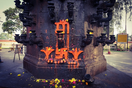 ujjain- m.p.- india- 9 november 2019, holy symbol of hindu goddess in maa harsiddhi temple at ujjain, lower part of the pillar of lamp
