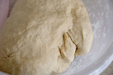 freshly mixed dough, wheat flour dough, new knead the dough in a bowl,
