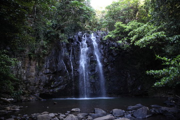 Fototapeta na wymiar Beautiful waterfall hidden in the tropical rain forest - Image