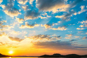 Fototapeta premium Background sky during sunset and water reflections.