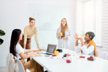 Fototapeta premium Successful leadership. young businesswomen activey discuss and speak about business plan and new ideas for future company developing