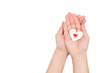 Red heart in woman hand isolated.