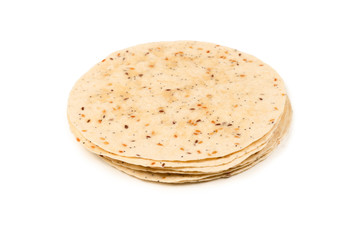 Pitta bread with seeds isolated on white