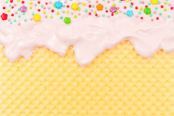 Sweet waffle background with cream.