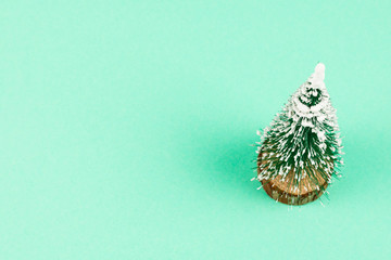 Christmas tree on a green background.