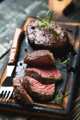 A pair of grilled marbled beef steaks