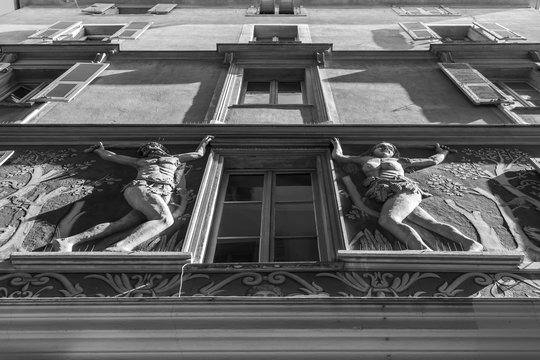 Nice, France, October 10, 2019. Typical architecture of the Provence region. Fragment of the bas-relief on the residential house Maison d 'Adam et Eve (grizzle technique, 1584)