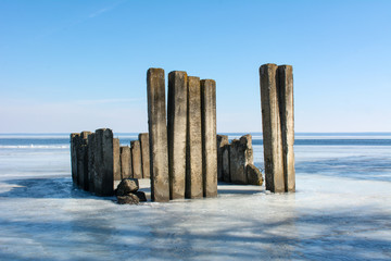 old breakwater in the river - 308255299