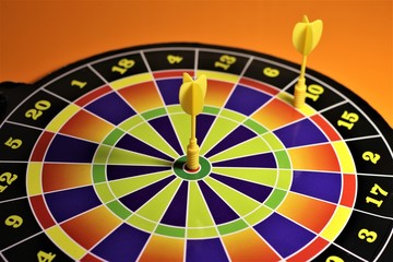 Obraz premium Board dartboard with two Darts at the target