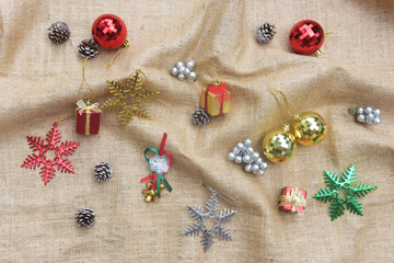 Christmas balls stacked on fabric, happy new year, merry christmas