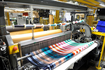 Textile industry with knitting machines in factory - italian - made in Italy