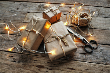 Gift packages wrapped with kraft paper and tied with rope