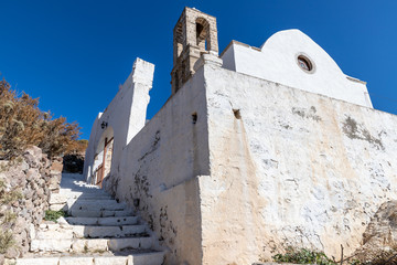 Church with stairs and tower in Plaka village