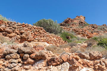 Details of rocks and vegetation in Plathiena beach
