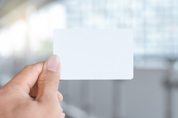 hand holding empty blank white business card mock up design text for advertisement  branding.