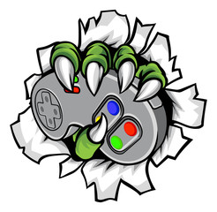 Monster gamer hand or claw holding a console video games controller and smashing through the background