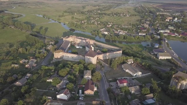 Aerial to Medzhybizh Castle and Church of St. Nicholas, one of the strongest fortres of the Crown of the Kingdom of Poland in Podolia. It is situated at confluence of Southern Bug rivers, Ukraine