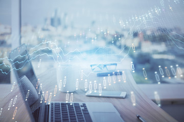 Forex Chart hologram on table with computer background. Multi exposure. Concept of financial markets.