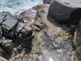 rock in sea water beach