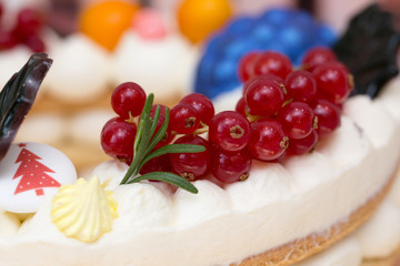 Beautiful birthday cake decorated with decor and fresh berries
