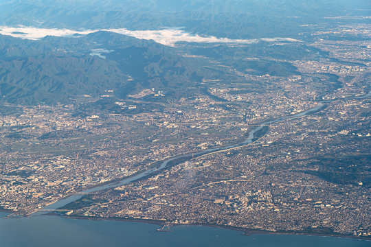 Aerial view of Shonan region in sunrise time with blue sky horizon background, Kanagawa Prefecture, Japan