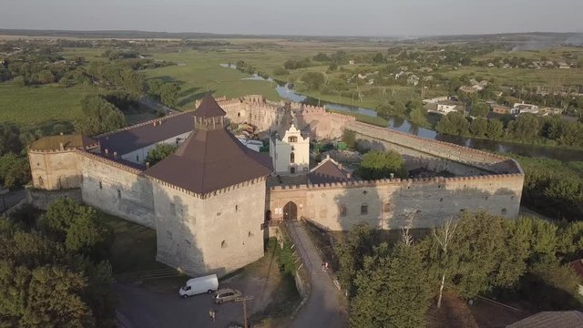 Aerial to Medzhybizh Castle and Church of St. Nicholas, one of the strongest fortres of the Crown of the Kingdom of Poland in Podolia. It is situated at confluence of Southern Bug rivers, Ukraine