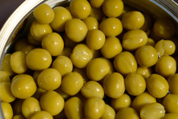 Canned green peas in a jar. Shallow depth of field