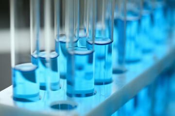 Test tube of glass overflows liquid solution potassium